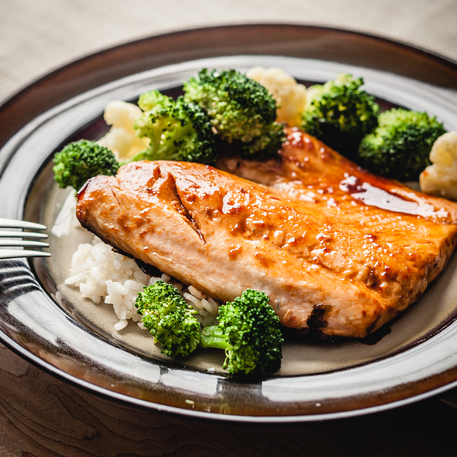 sous vide salmon with steamed rice and broccoli